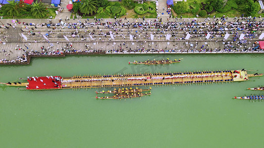 历史文化传统摄影照片_俯拍传统端午佳节赛龙舟游行仪式模板
