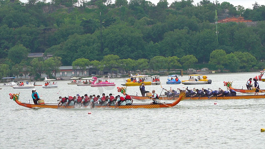传统端午节赛龙舟摄影照片_实拍端午节传统节日活动赛龙舟模板
