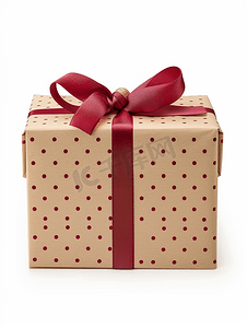 有惊喜礼品摄影照片_米色圆点礼品盒白色背景上有红丝带蝴蝶结
