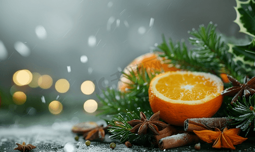 儿童节小标题摄影照片_圣诞花卉小插图配有麦芽酒树枝、橙子和香料