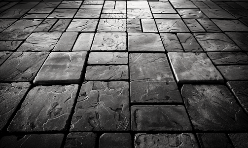 地板铺摄影照片_正方形形式的抽象背景灰色铺路板