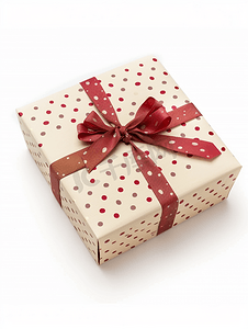 白色白色框摄影照片_米色圆点礼品盒白色背景上有红丝带蝴蝶结