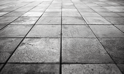 正方形形式的抽象背景灰色铺路板