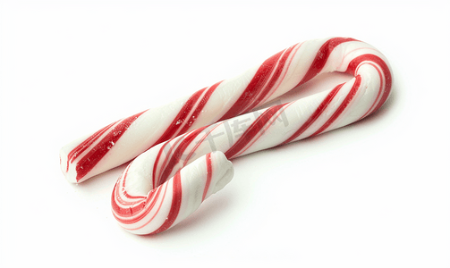 白色背景中的两根拐杖糖传统的圣诞糖果