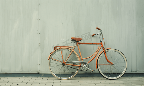 城镇卡通摄影照片_靠在墙上的老式自行车