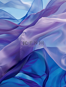 飞扬的轻纱蓝色和紫色背景图片