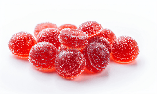 美味插图摄影照片_红色果酱糖果被孤立在白色背景上