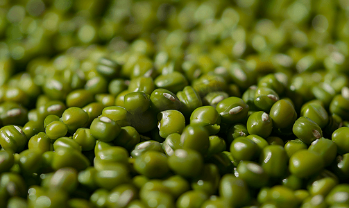 绿色谷物背景摄影照片_背景未加工的绿色绿豆