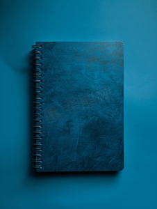 手册封面摄影照片_深蓝色封闭的笔记本模型