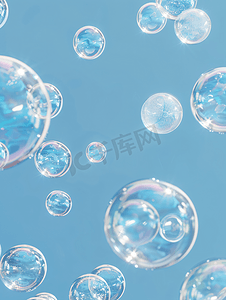 圆形的球摄影照片_蓝色背景中肥皂泡的无缝图案