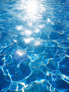 蓝色泳池水面与太阳反射的水背景