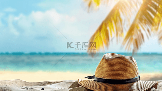 大海沙滩背景图片_夏日海滩风景沙滩上的遮阳帽素材