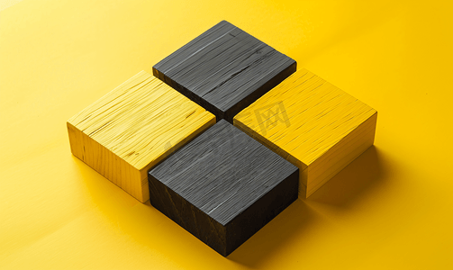 黄色几何学习摄影照片_空的四块黄色木块矩形形状中间有一块黑色木块
