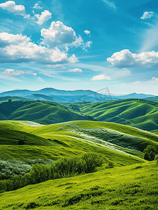 起伏降低摄影照片_风景秀丽的绿色连绵起伏的山丘映衬着蓝天白云