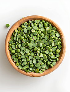 干豆类摄影照片_圆碗中生干绿豌豆分离