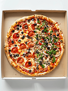 中面摄影照片_披萨盒中的两张顶面披萨