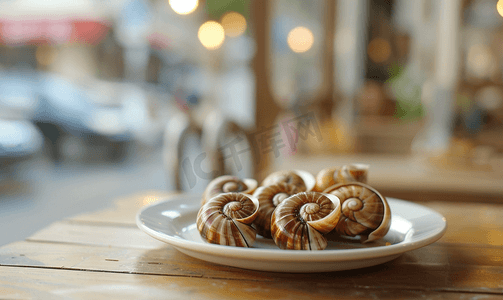 蜗牛的背景摄影照片_法国咖啡馆盘子里的蜗牛
