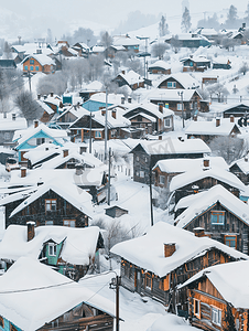 村庄房屋摄影照片_屋顶上的雪冬天的村庄村庄房屋细节