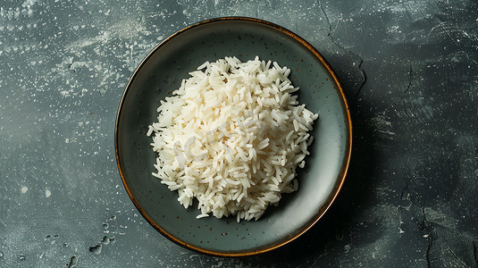 大米撒落摄影照片_米饭大米食物瓷碗摄影照片