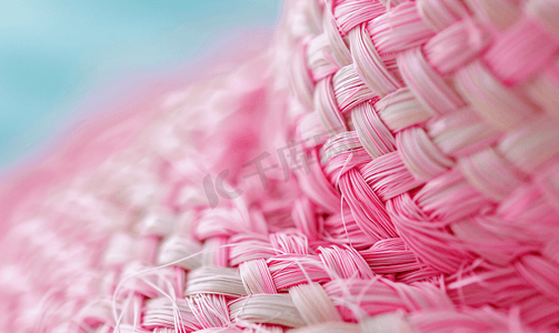 编织结构摄影照片_用粉色东洋纤维编织草帽