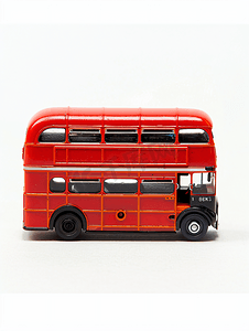 红色复古背景摄影照片_孤立的红色巴士双层玩具复古风格是白色背景剪裁路径
