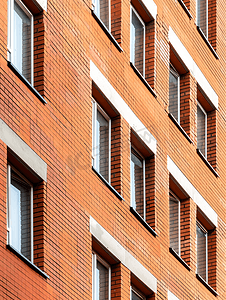 从窗口摄影照片_从透视角度看红砖建筑的现代城市建筑