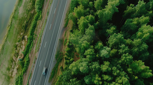 绿色森林的公路道路高清摄影图