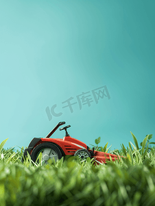 草地设计摄影照片_绿草和红色的割草机