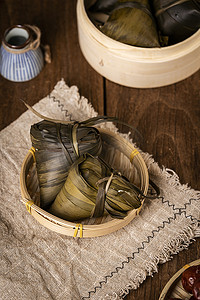 传统中式海报摄影照片_煮好的粽子端午节图片