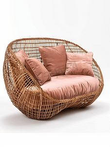 图案说明摄影照片_白色背景上带粉色垫子的棕色藤条沙发