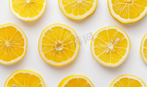 港风图案摄影照片_黄柠檬柑橘片柑橘平躺的图案