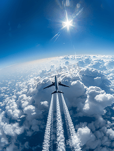 空中飞机摄影照片_云景与飞机的踪迹