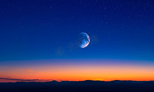 发光线条科技摄影照片_日落时深蓝色天空中的新月
