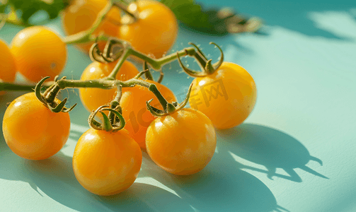 水果黄色摄影照片_黄色樱桃番茄