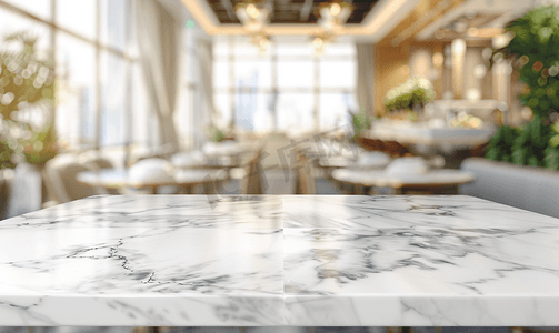 白色大理石台面摄影照片_大理石桌面与模糊的厨房咖啡厅餐厅内部背景