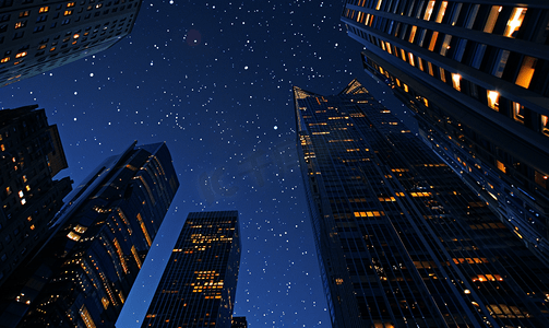 建筑剪影几何摄影照片_夜晚仰望深蓝色天空下的摩天大楼