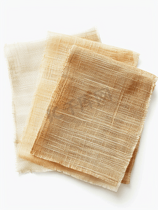 亚麻织物摄影照片_在白色背景上隔离的米色织物样本