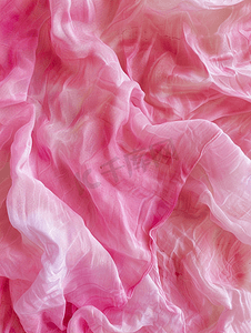 淡粉色摄影照片_扎染蜡染粉色围巾图案