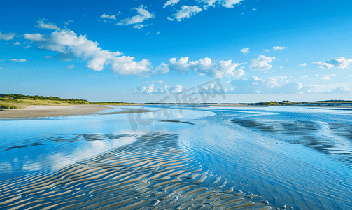 湿地鸟类摄影照片_海角沿岸的潮滩和滩涂