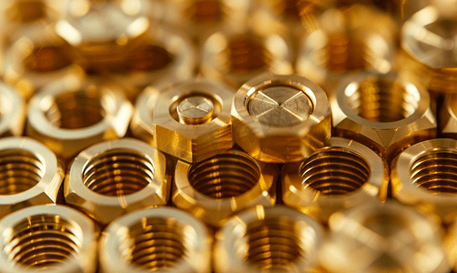 闪亮黄铜金属螺纹六边形零件的抽象工业背景