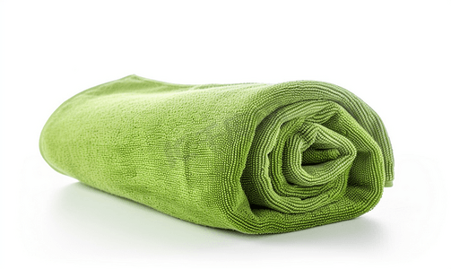 洗涤背景摄影照片_白色背景下的绿色沙滩巾