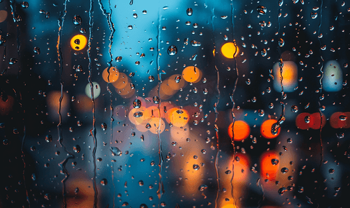 透明矩形玻璃材质摄影照片_雨天窗户雨滴在高速公路背景玻璃上安全回家