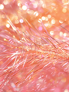 抽象的粉色和金色金属丝特写背景与散景散焦