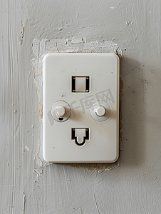 电气插座摄影照片_关闭墙上的电源插座和插座