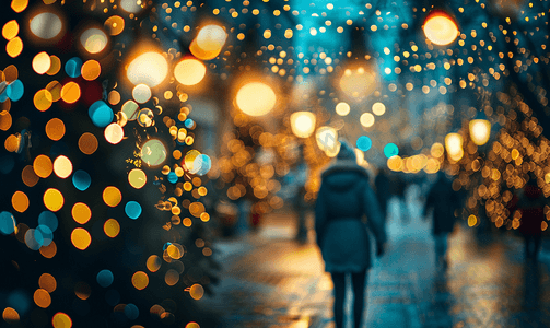 装饰运动摄影照片_夜街上路灯模糊的圣诞背景