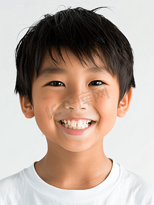 牙科邀请卡摄影照片_亚洲男孩微笑着蛀牙