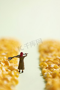 粥图片摄影照片_玉米渣创意农民丰收图片