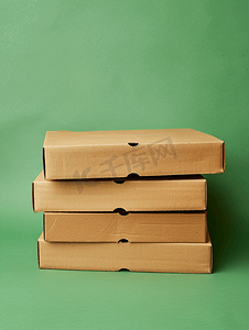 弯月扁平摄影照片_扁平棕色纸板披萨盒