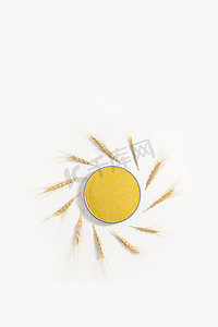 黄太阳摄影照片_粮食小米太阳造型图片