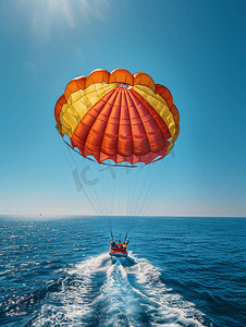 飞行标志摄影照片_海洋滑翔伞